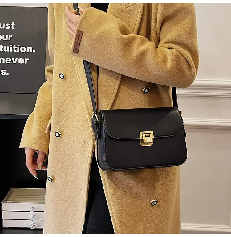 Black Leather Shoulder Bag with Gold Clasp 2023 — feature 35