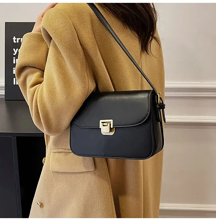 Black Leather Shoulder Bag with Gold Clasp 2023 — feature 36