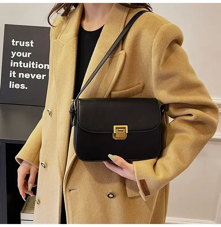 Black Leather Shoulder Bag with Gold Clasp 2023 — feature 37