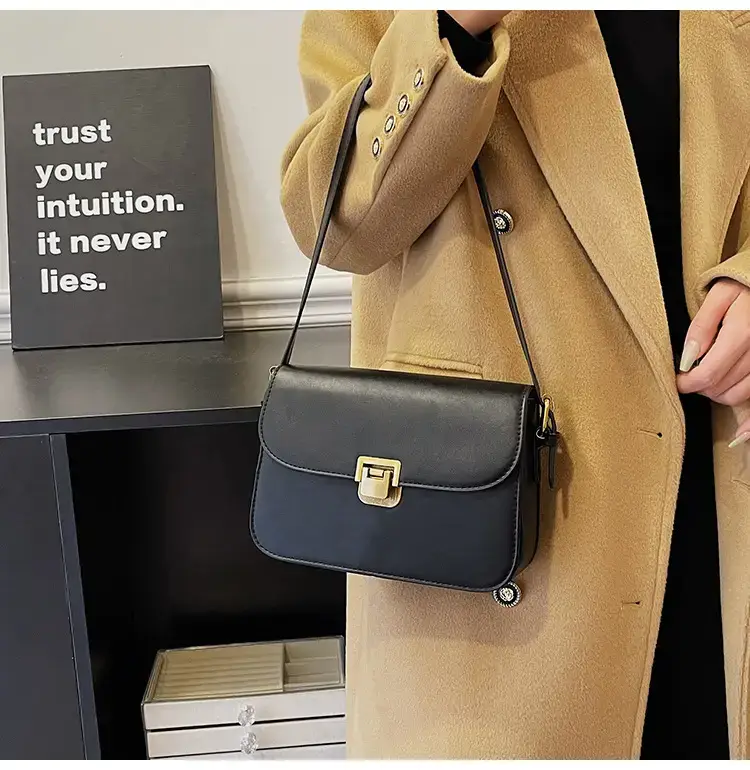Black Leather Shoulder Bag with Gold Clasp 2023 — feature 39