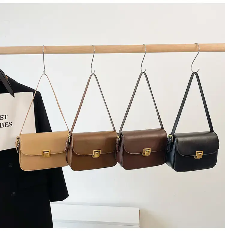 Black Leather Shoulder Bag with Gold Clasp 2023 — feature 40