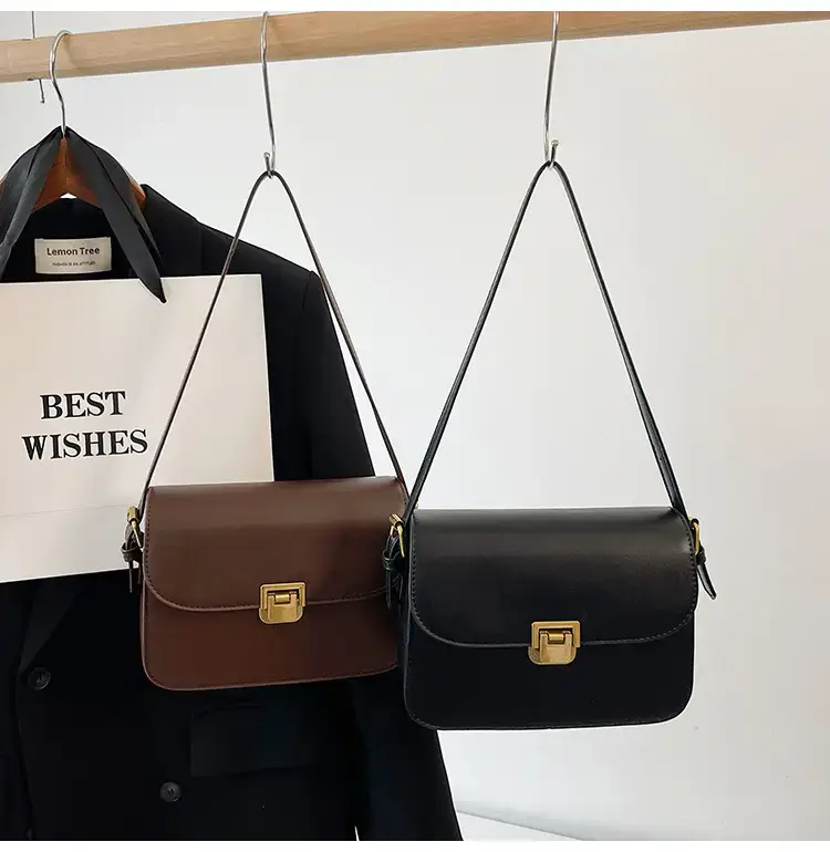 Black Leather Shoulder Bag with Gold Clasp 2023 — feature 41