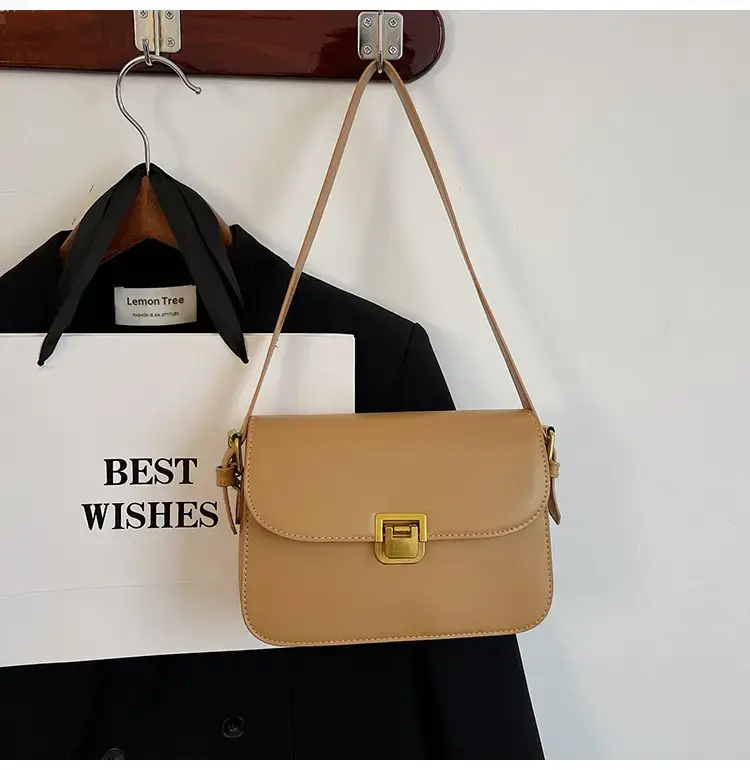 Black Leather Shoulder Bag with Gold Clasp 2023 — feature 42