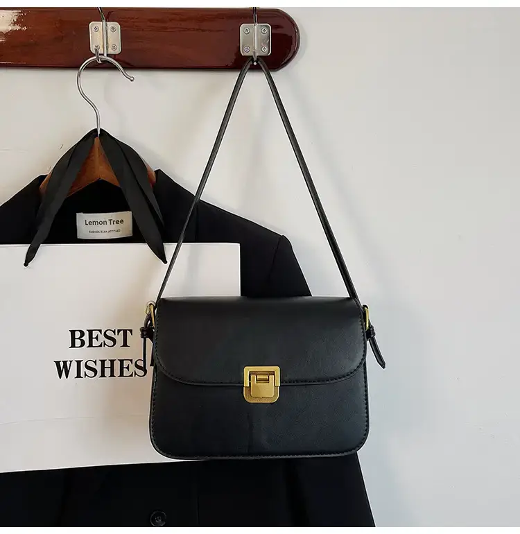 Black Leather Shoulder Bag with Gold Clasp 2023 — feature 44