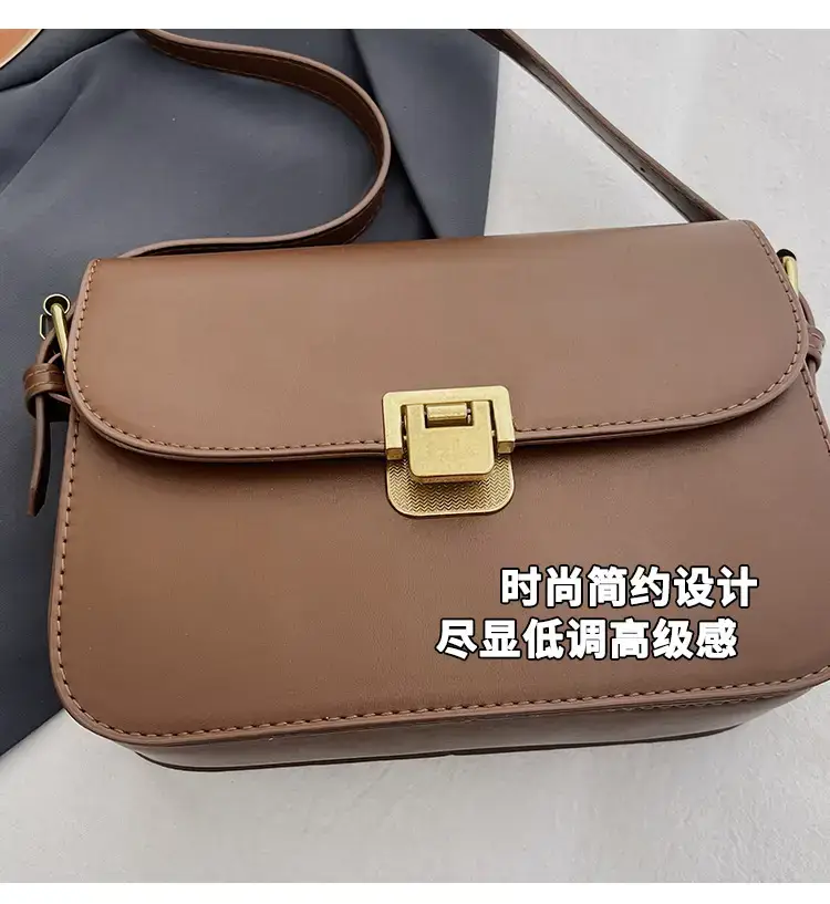 Black Leather Shoulder Bag with Gold Clasp 2023 — feature 5