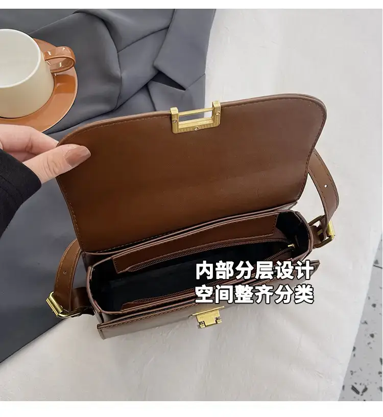 Black Leather Shoulder Bag with Gold Clasp 2023 — feature 9