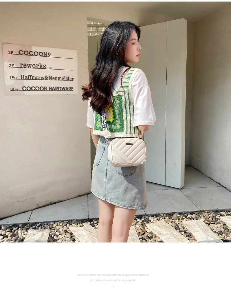 White Quilted Crossbody Bag with Embroidered Design — feature 17