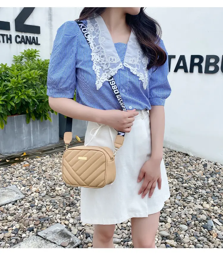 White Quilted Crossbody Bag with Embroidered Design — feature 23