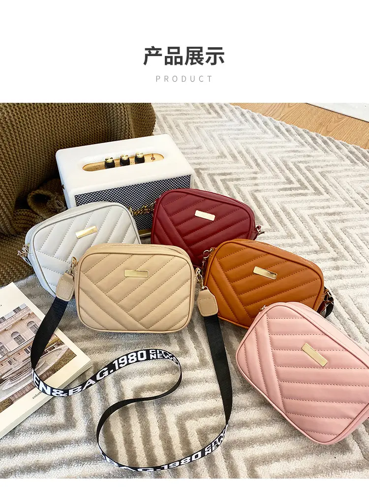 White Quilted Crossbody Bag with Embroidered Design — feature 24