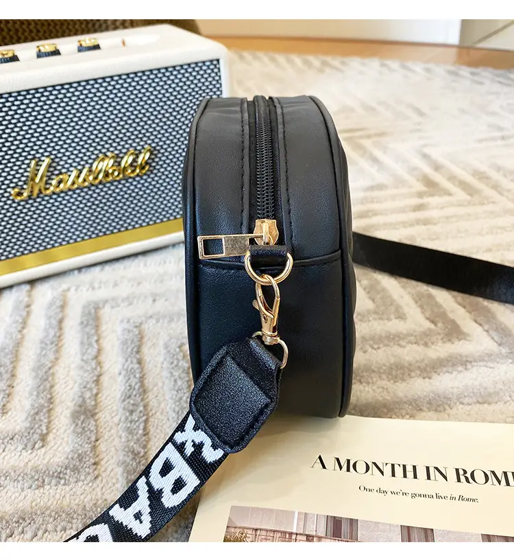 White Quilted Crossbody Bag with Embroidered Design — feature 26