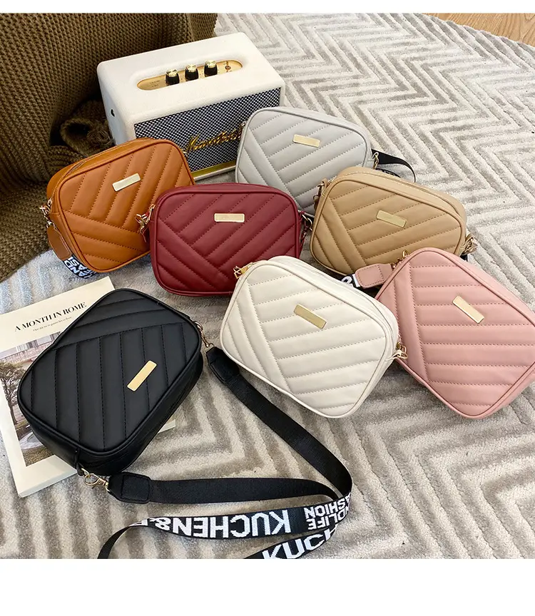 White Quilted Crossbody Bag with Embroidered Design — feature 3