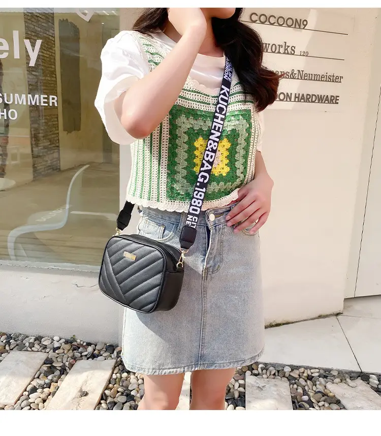 White Quilted Crossbody Bag with Embroidered Design — feature 9