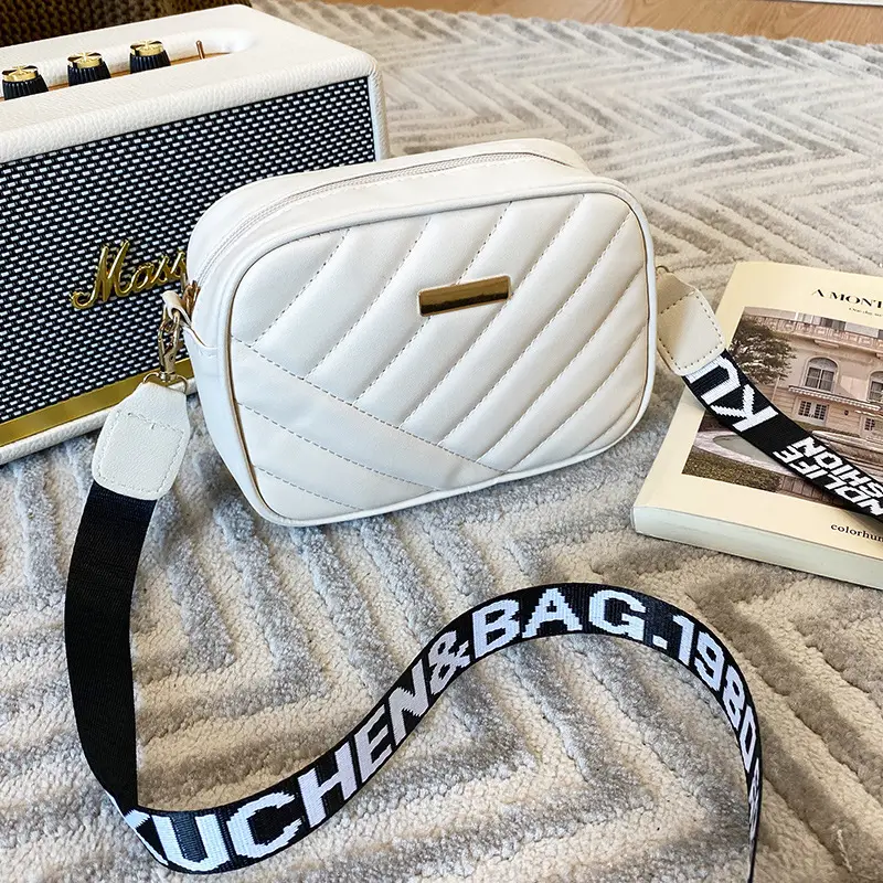 White Quilted Crossbody Bag with Embroidered Design - Image 2