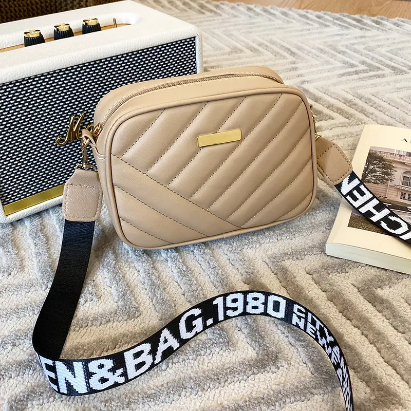 White Quilted Crossbody Bag with Embroidered Design - Image 4