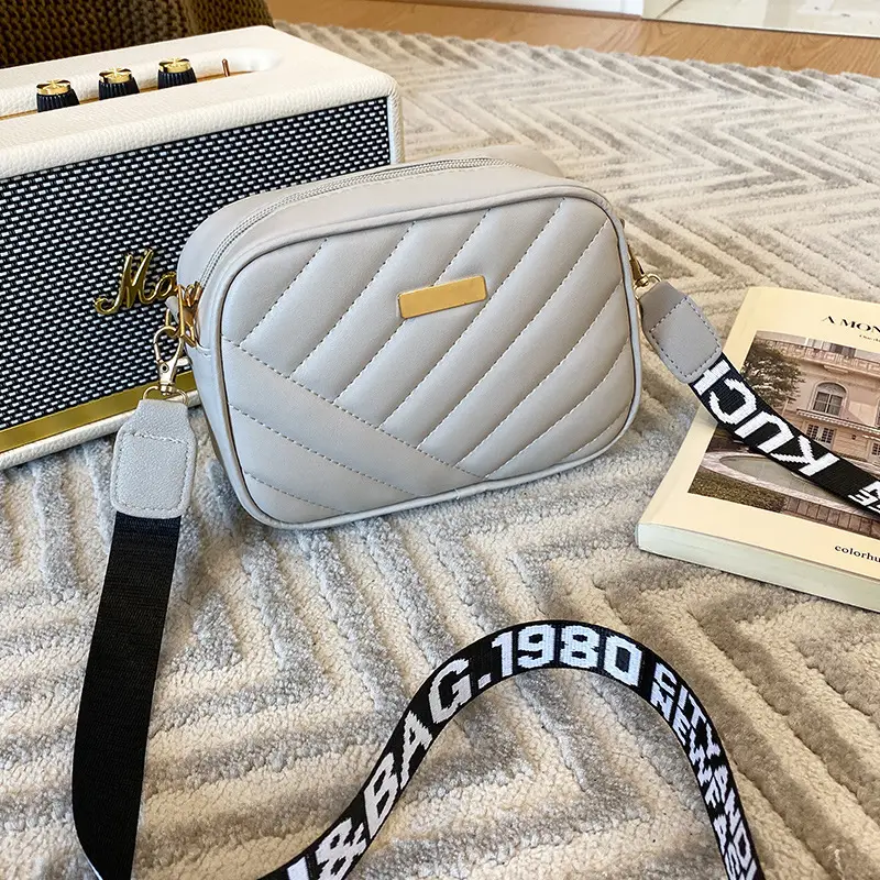 White Quilted Crossbody Bag with Embroidered Design - Image 7