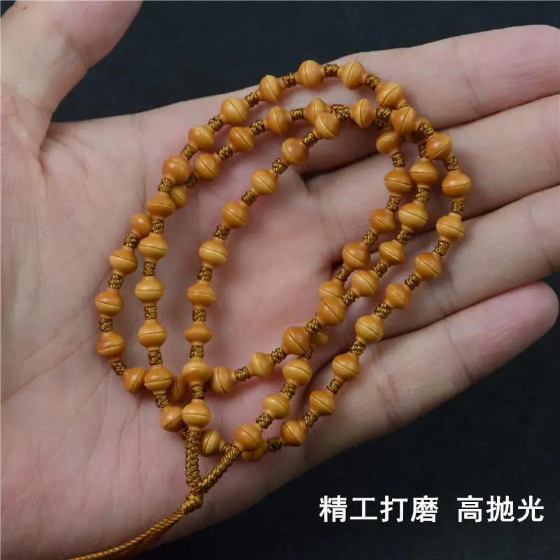 Handcrafted Olive Wooden Necklace with Golden Spacers - Image 6