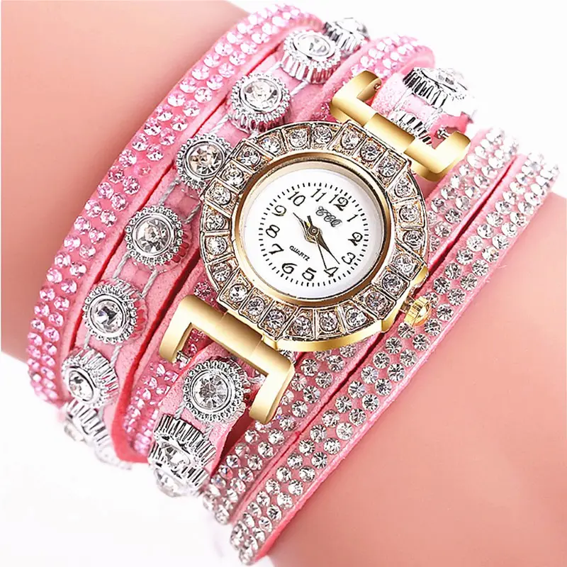Women's Diamond-Enriched Cross Strap Watch with Gold Plated Face — feature 1