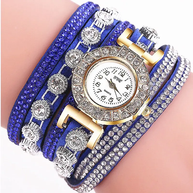 Women's Diamond-Enriched Cross Strap Watch with Gold Plated Face — feature 3