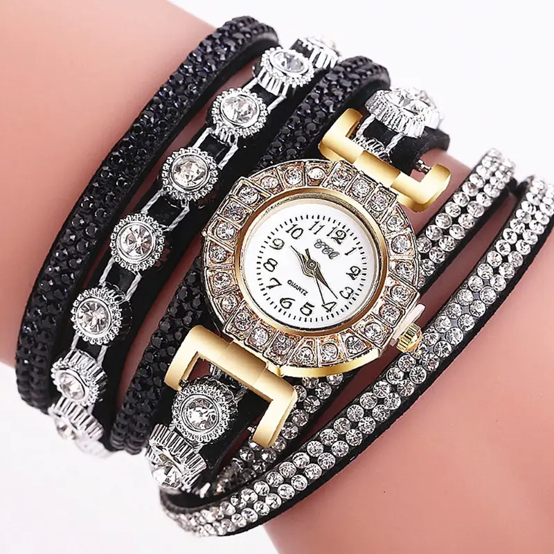 Women's Diamond-Enriched Cross Strap Watch with Gold Plated Face — feature 4