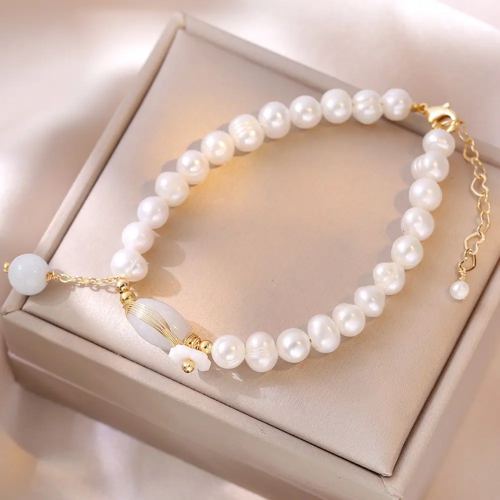 Natural Pearl Bracelet with Transport Jade Design