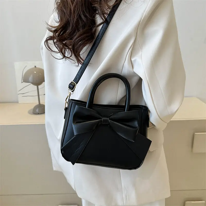 White Textured Bow Crossbody Bag 2023 - Image 7