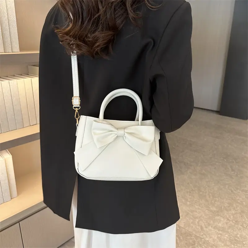 White Textured Bow Crossbody Bag 2023 - Image 8