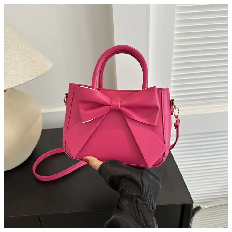 White Textured Bow Crossbody Bag 2023 — feature 12