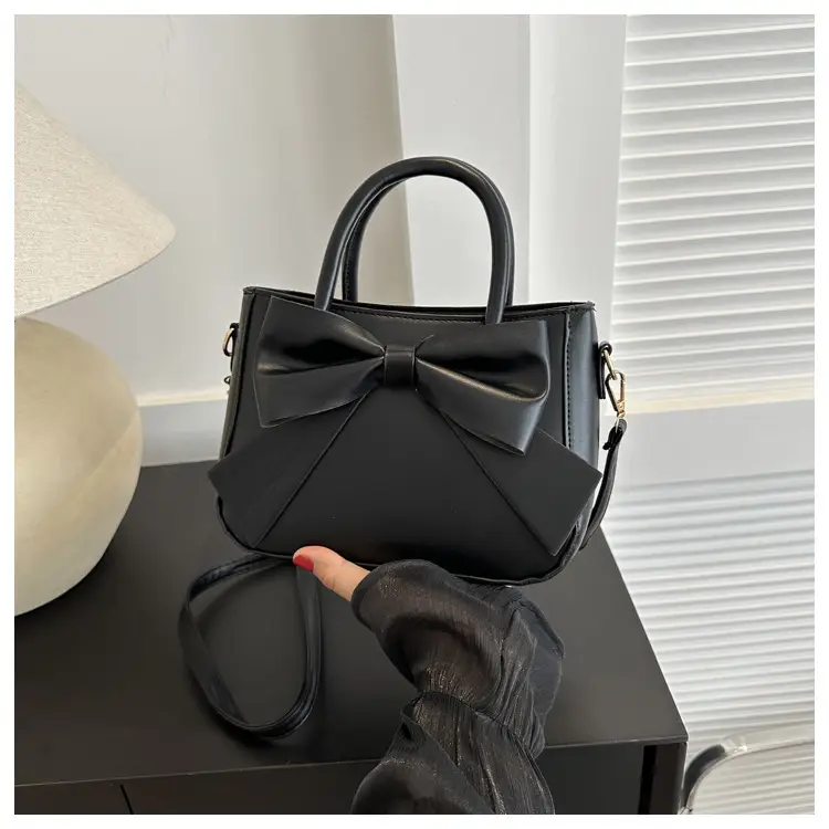 White Textured Bow Crossbody Bag 2023 — feature 14