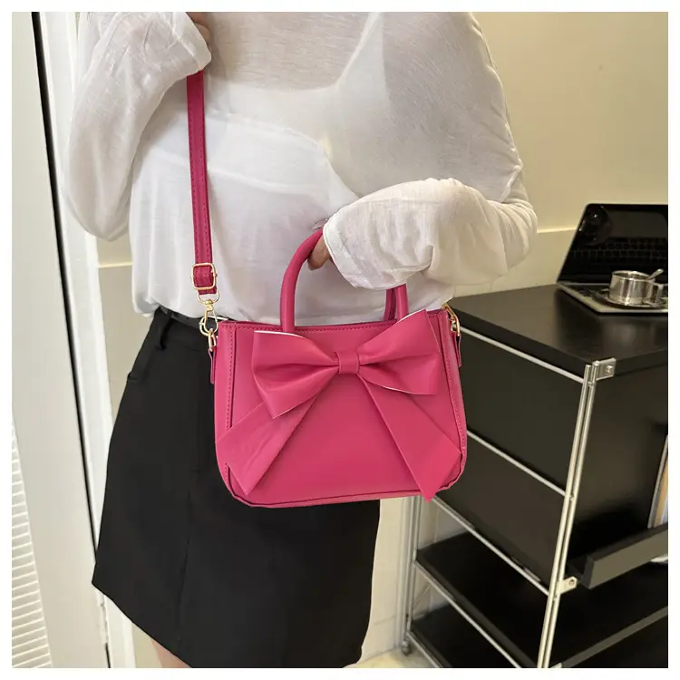 White Textured Bow Crossbody Bag 2023 — feature 17