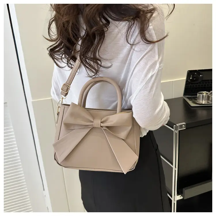 White Textured Bow Crossbody Bag 2023 — feature 20