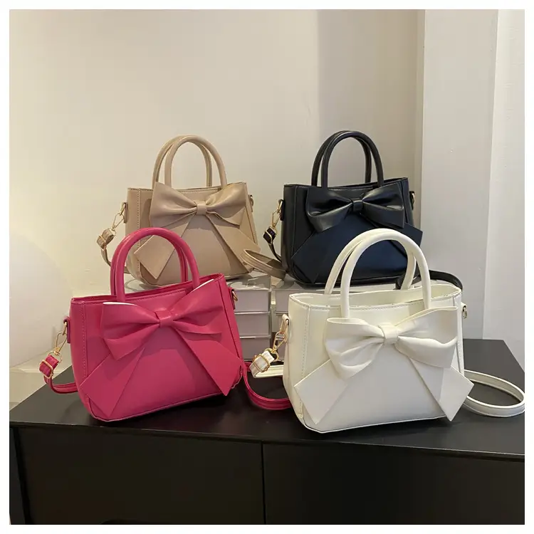 White Textured Bow Crossbody Bag 2023 — feature 25