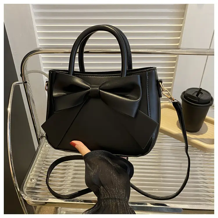 White Textured Bow Crossbody Bag 2023 - Image 3