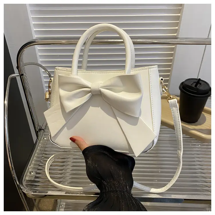 White Textured Bow Crossbody Bag 2023 - Image 4