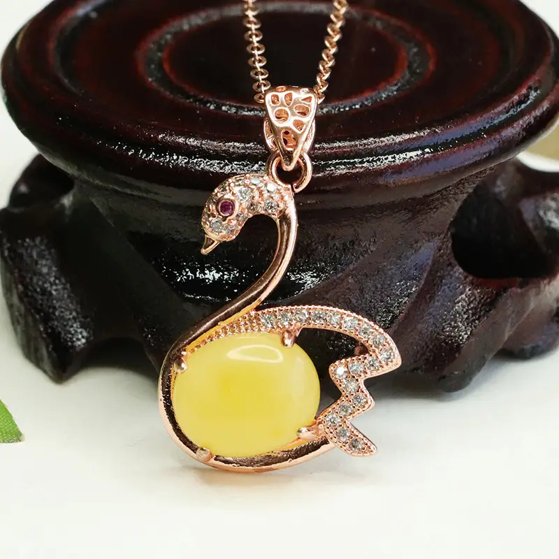 Women's Rose Gold Swan Necklace with Yellow Amber Pendant — feature 1