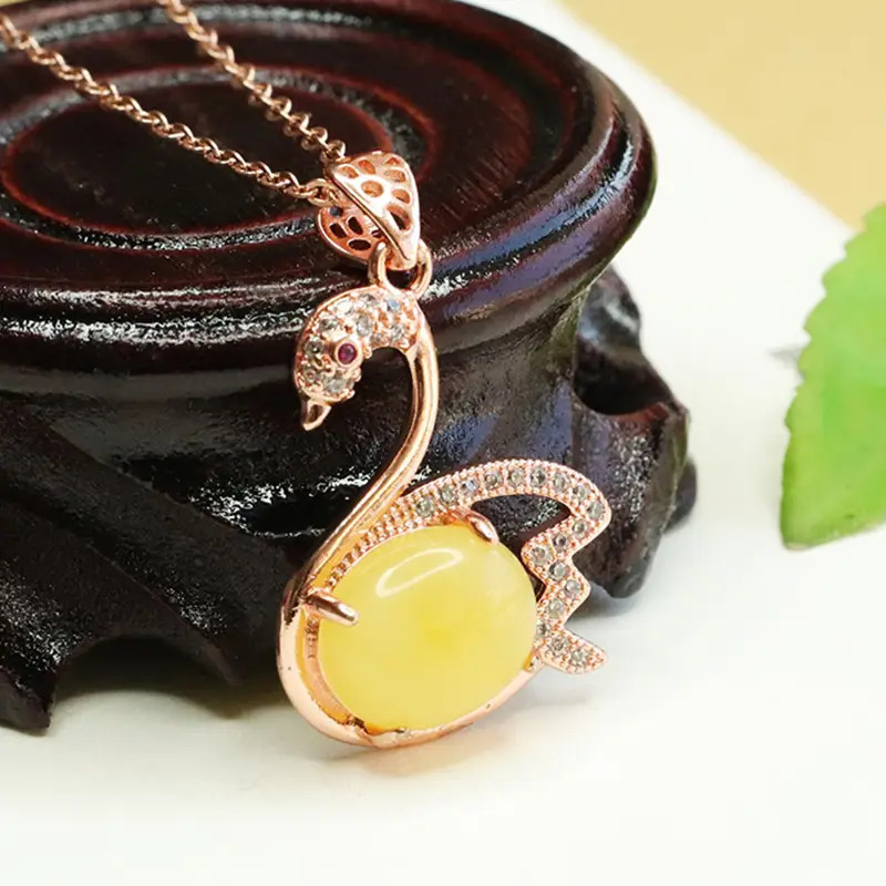 Women's Rose Gold Swan Necklace with Yellow Amber Pendant — feature 5