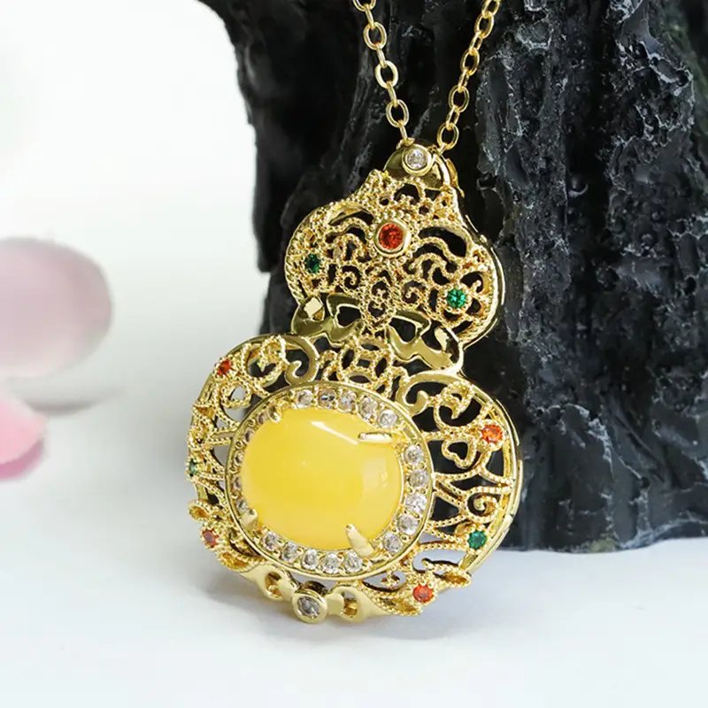 Ethnic Gold Pendant Necklace with Yellow Amber Gourd Design