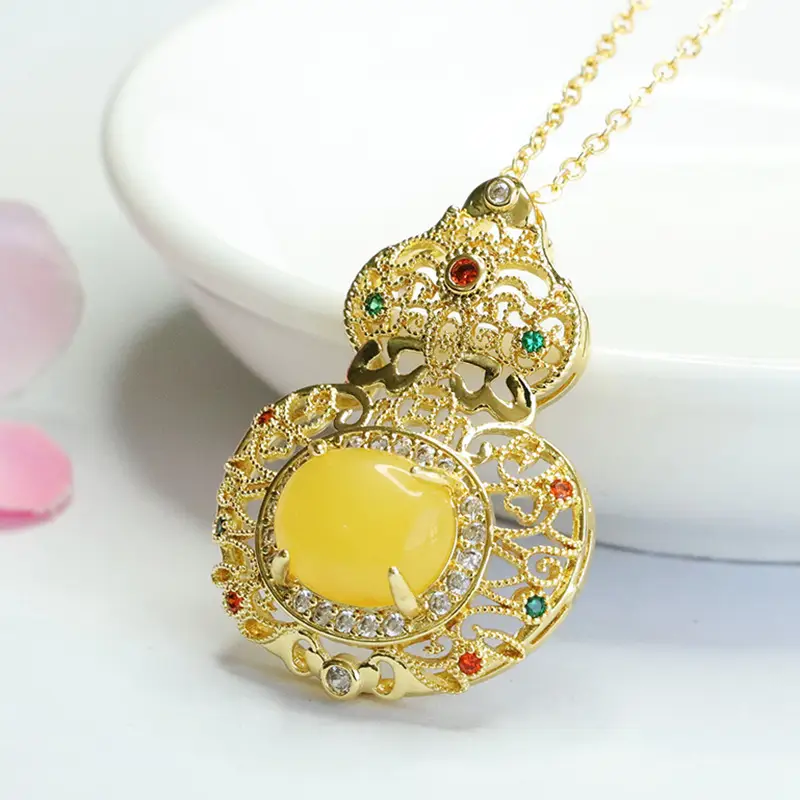 Ethnic Gold Pendant Necklace with Yellow Amber Gourd Design