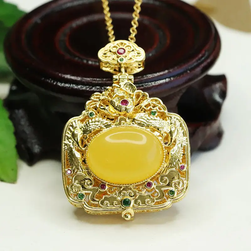 Yellow Amber Phoenix Necklace with Golden Finish — feature 1