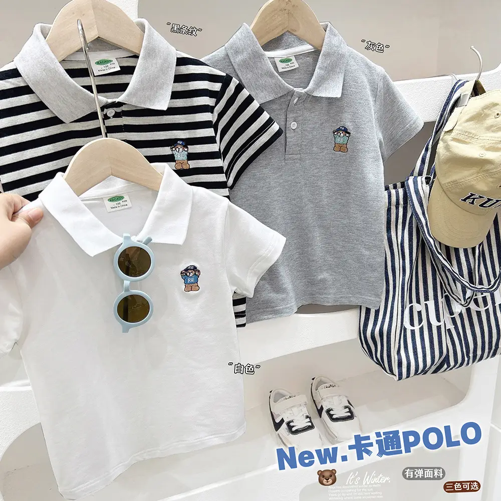 Boys White Polo Shirt with Cartoon Logo Medium to XL — feature 1