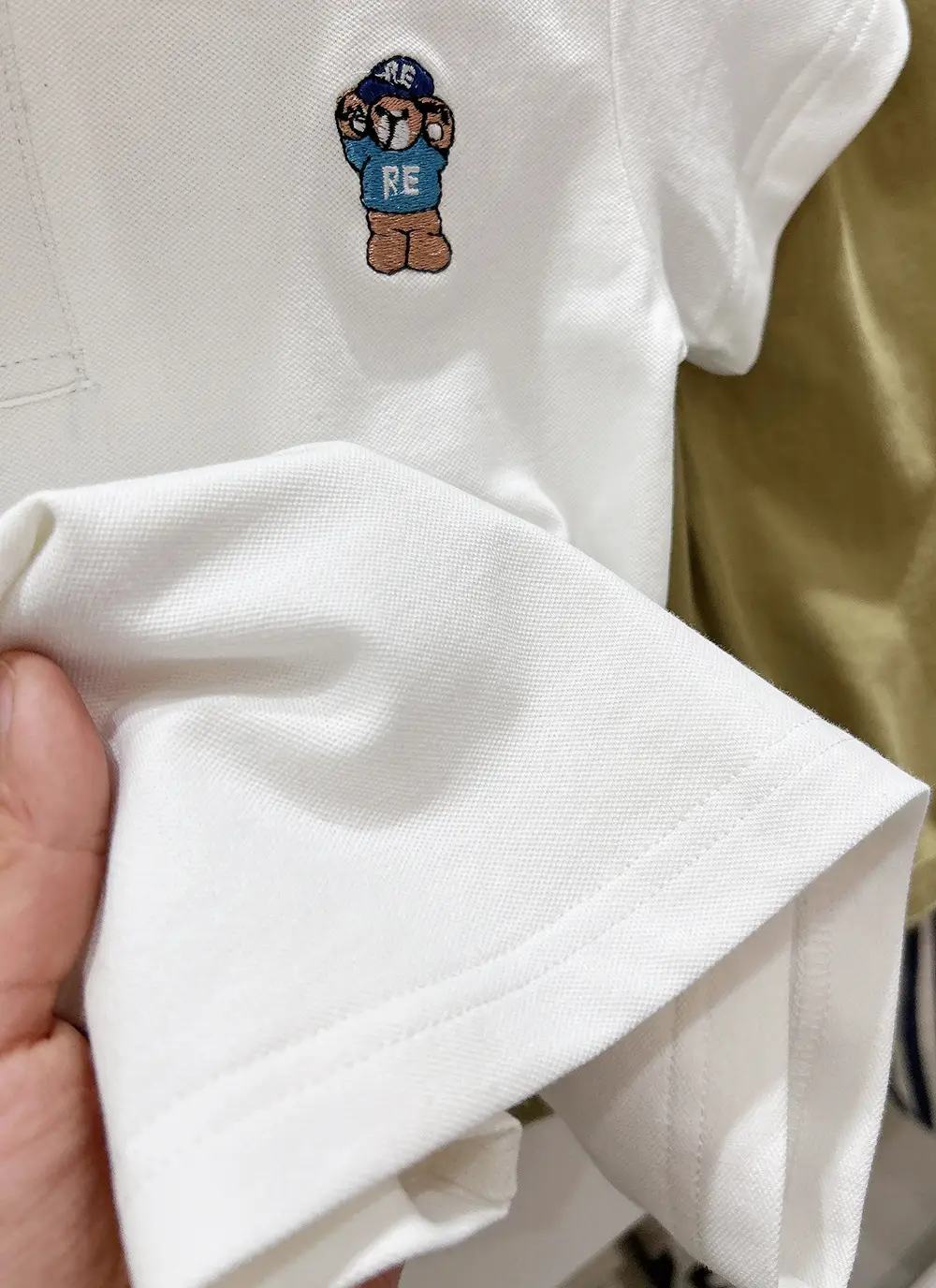 Boys White Polo Shirt with Cartoon Logo Medium to XL — feature 10