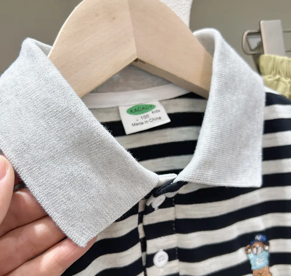 Boys White Polo Shirt with Cartoon Logo Medium to XL — feature 5
