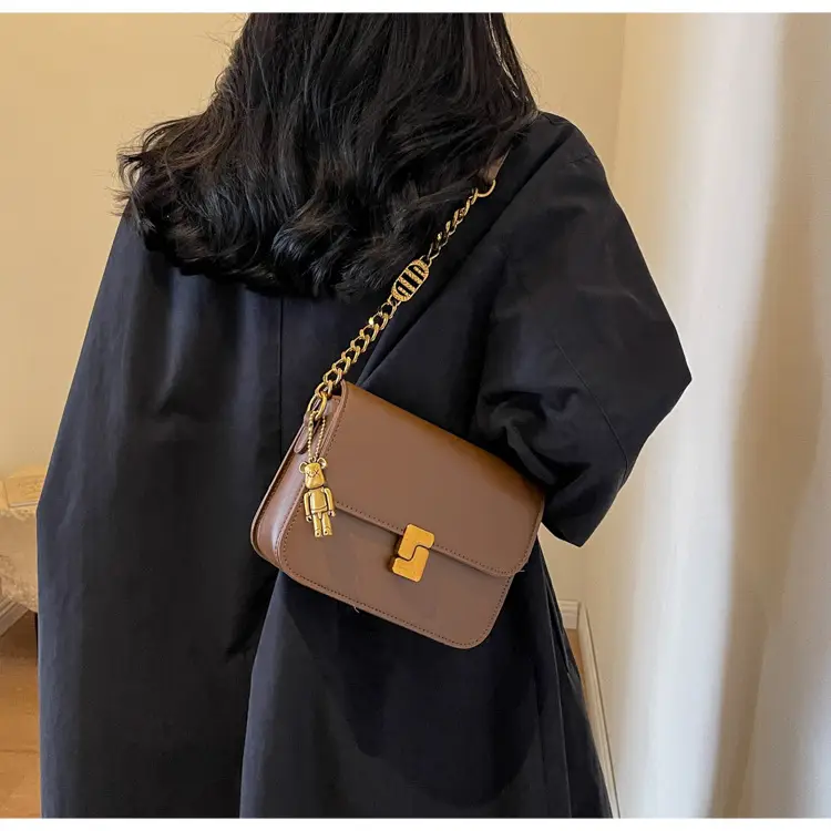 Black Crossbody Bag with Gold Chain & Clasp — feature 19