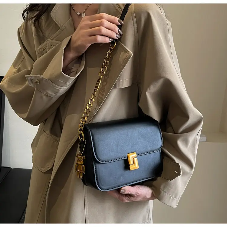 Black Crossbody Bag with Gold Chain & Clasp — feature 22