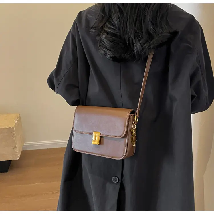 Black Crossbody Bag with Gold Chain & Clasp — feature 26