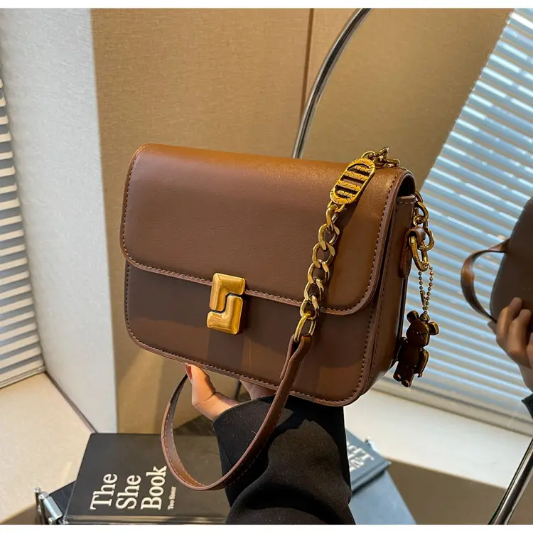 Black Crossbody Bag with Gold Chain & Clasp — feature 29