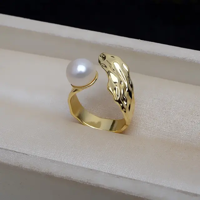Gold Pearl Ring with Ornate Design for Women