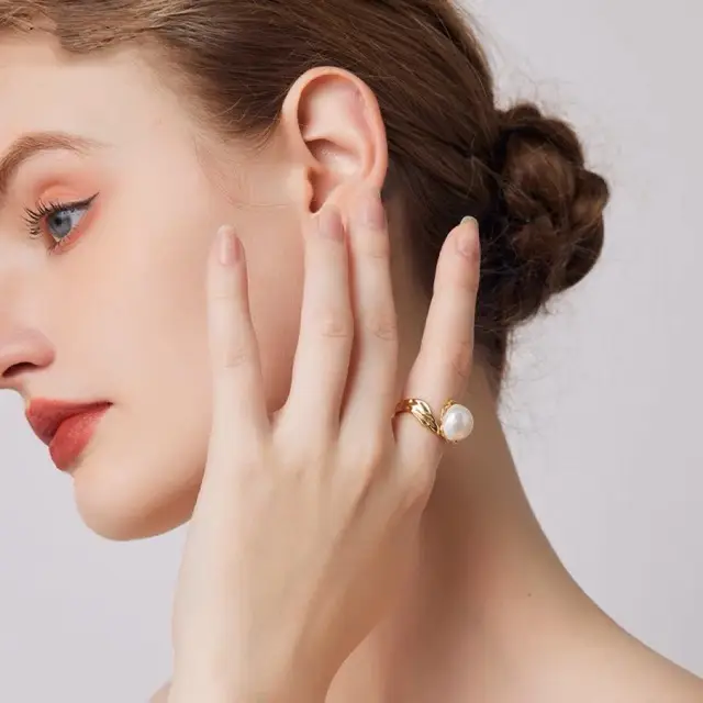 Gold Pearl Ring with Ornate Design for Women