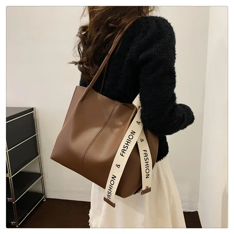 2023 Winter Brown Leather Shoulder Bag with "POV Fashion" Strap — feature 15