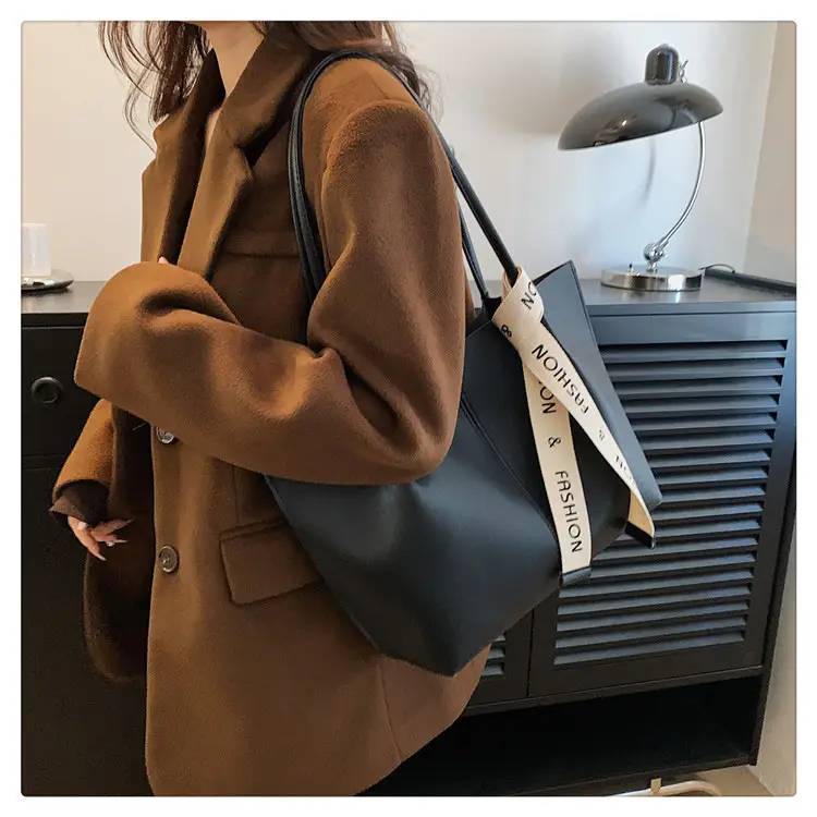 2023 Winter Brown Leather Shoulder Bag with "POV Fashion" Strap — feature 17