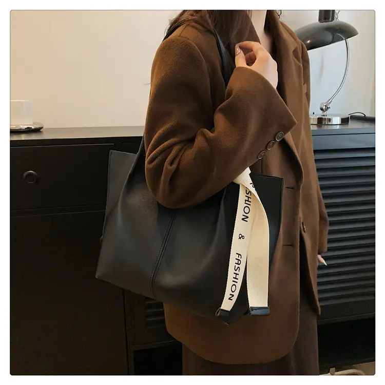 2023 Winter Brown Leather Shoulder Bag with "POV Fashion" Strap — feature 18